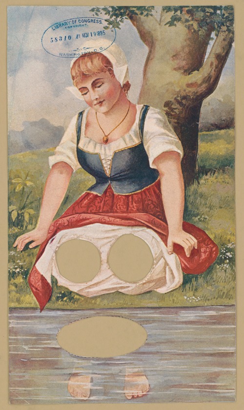 Woman kneeling at waterside