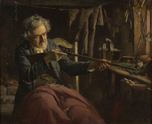 Homme réparant un fusil