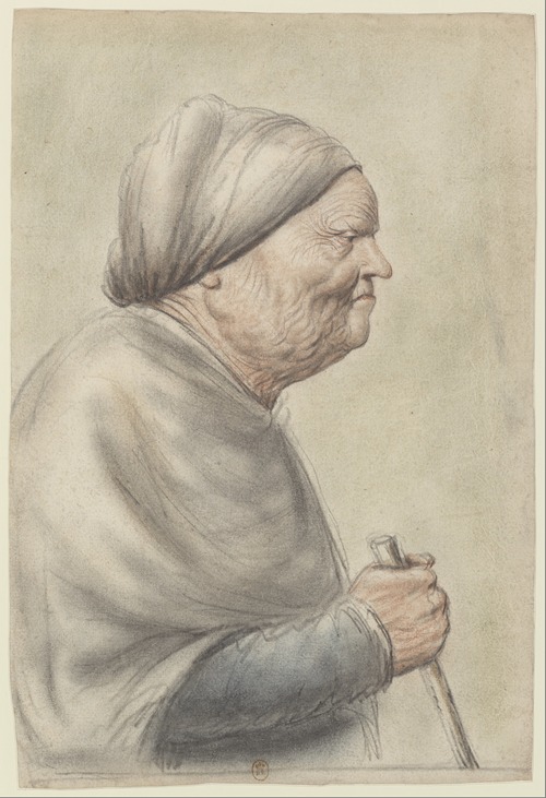 Femme âgée, portant une coiffe blanche, tenant une canne dans la main droite, vue de profil à droite