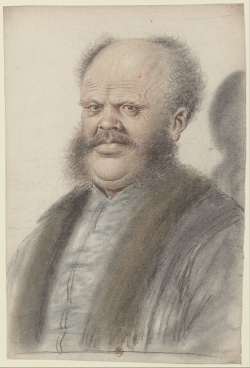 Homme au crâne dégarni, portant moustaches et larges pattes de cheveux descendant sur les joues, vu presque de face