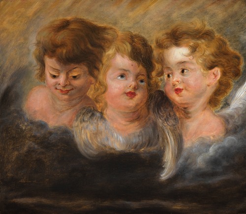Drie engelenkopjes in wolken
