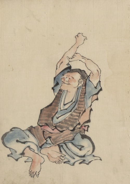A man, facing left, wearing several layers of clothing, sitting with arms raised over his head, practicing yoga