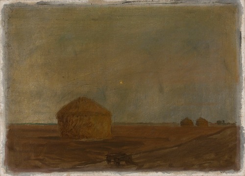 Haystacks at dusk