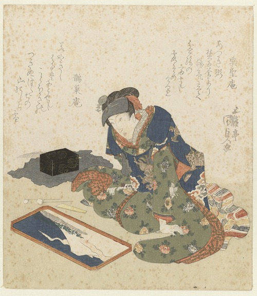 Woman making a sand painting