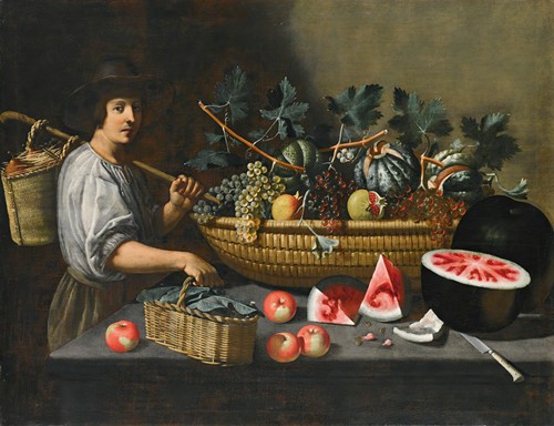 A Still Life Of Grapes, Melons And Pomegranates On A Stone Ledge With A Figure Carrying A Basket On The Left