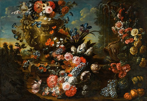 A stone urn on steps decorated with flowers and fruit beside a dolphin-headed fountain in an extensive landscape