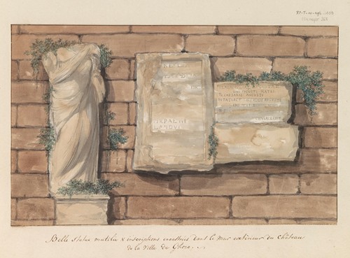 Beschadigd beeld en inscripties gemetseld in muur van kasteel in stad Gozo