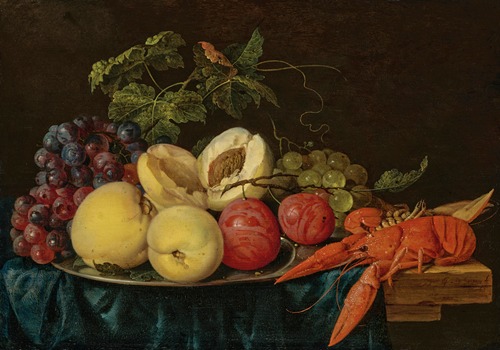 Fruit on a silver platter with lobsters on a partially draped table