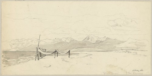 Fragment of seashore in the vicinity of Livorno with fishing nets stretched out on the beach