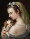 A Woman With A King Charles Spaniel