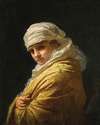 Young woman in a white turban