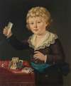 Portrait of a young boy playing with a house of cards
