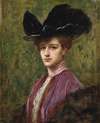 An elegant lady in a black hat