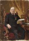 Portrait of a man in an armchair with papers in his hand