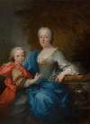 Portrait of a woman with a young boy in a park