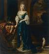 Portrait of an elegantly dressed young woman in an interior