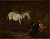 A man with a white horse