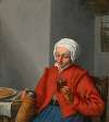 A woman holding a jug and a glass of beer, in an interior