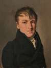 Portrait of a young man in a black suit
