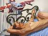Model on Cast Iron Bed with Weathervane Airplane #2