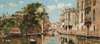 A gondolier before a Venetian bridge