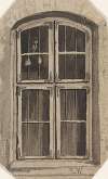 Figure Behind a Barred Window