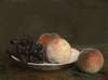 Peaches and grapes in a porcelain bowl