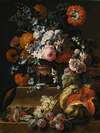 Still Life With Hollyhock, Carnations, And Various Flowers In A Vase On A Plinth With A Melon, Cherries, Grapes And Plums On A Ledge