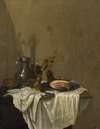 Still life with a pewter jug, roemers and a leg of ham, together on a table draped with a white tablecloth