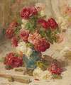 A still life with roses in a vase and a fan