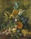 A pineapple, plums, grapes and other fruit with corn on a marble ledge