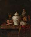 A chased silver ginger jar, a pocket-watch, a nautilis shell, a silver-gilt goblet, a kingfisher, fruit and other objects