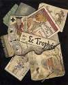 Trompe l’œil of playing cards, matches, posters and watercolour landscapes