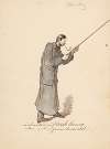 Man in a Long Military Coat with a Stick