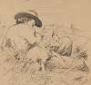 Man Laying in the Grass with a Dog