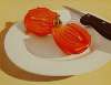 Open Persimmon on a White Plate